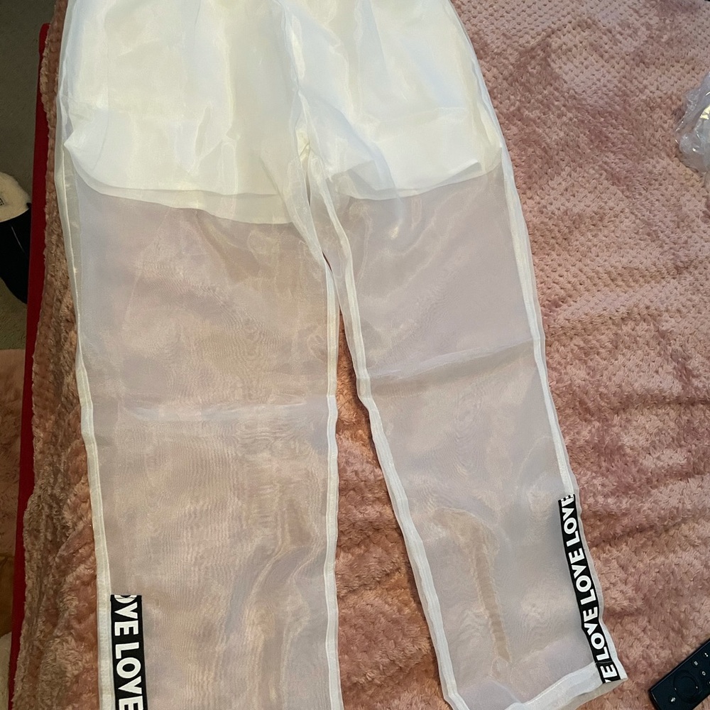 White sheer track pants